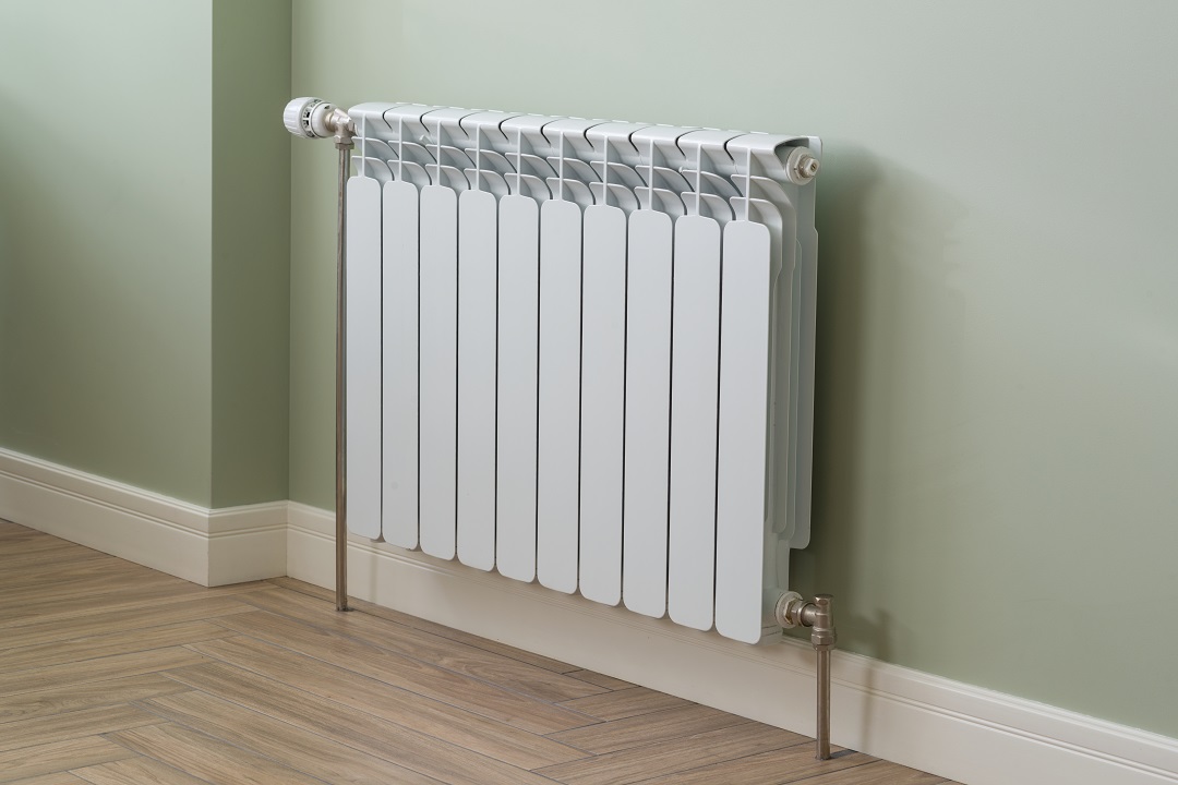 central heating radiator white radiator in an apartment